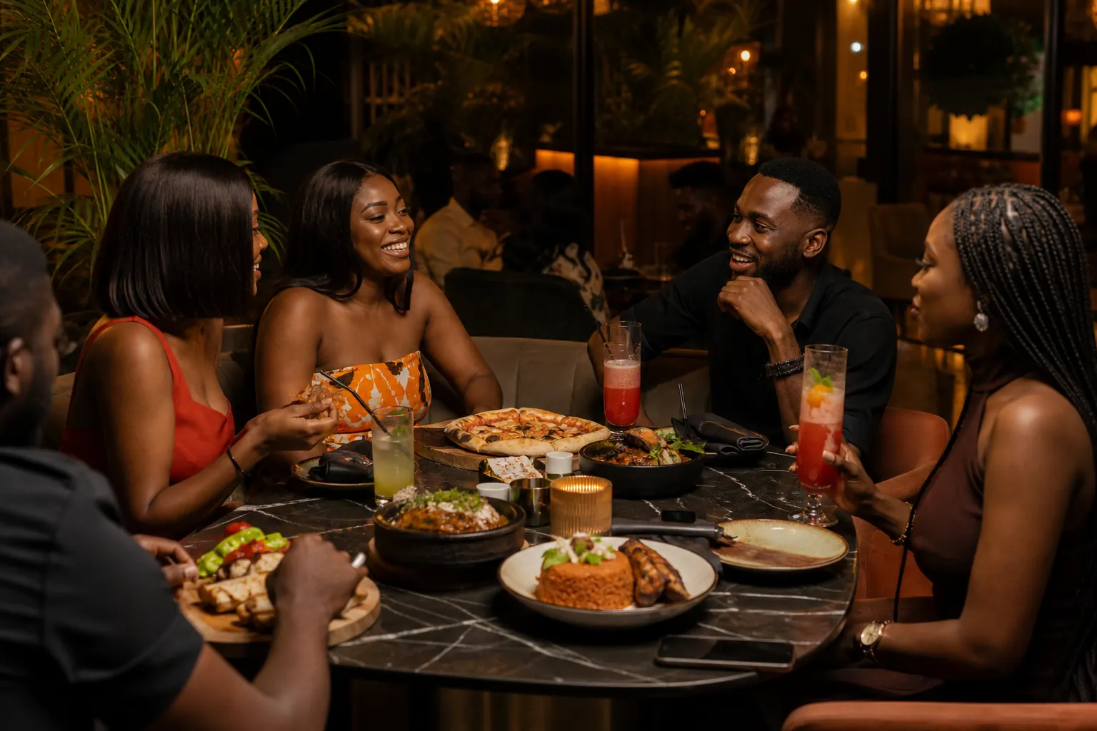 Friends dining together at Denada Lounge
